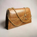 Elegant Brown Leather Clutch Bag with Gold Chain Strap