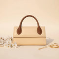 Elegant beige top handle bag for women, structured & chic style