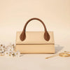 Elegant beige top handle bag for women, structured & chic style